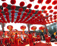 Chinese festivals feature traditional celebrations and colorful decoration. People are celebrating Chinese New Year in Beijing.