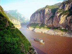 A boat sailing through the Three Gorges on the Yangtze