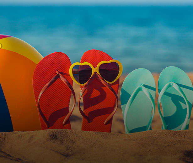 the colourful slipper on the beach